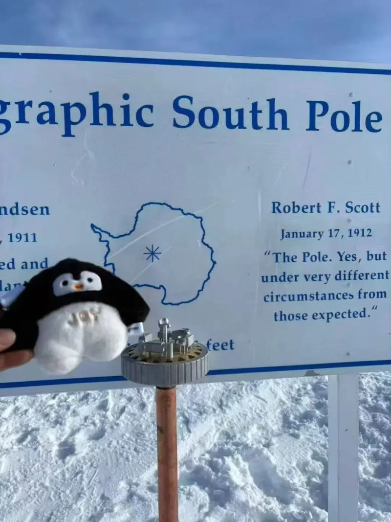 Joy mascot at the Geographic South Pole